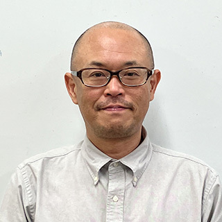 西井 正造